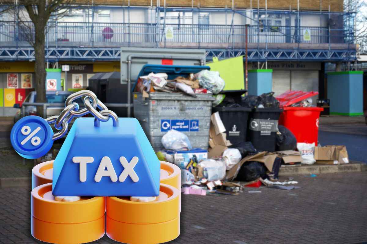 rifiuti in centro urbano e scritta tassa